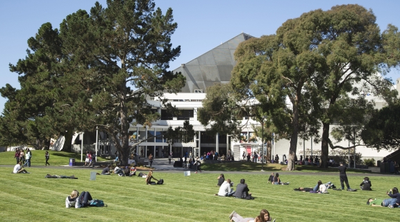 Photo: Students on Grass in front of SF State's Malcolm X Plaza